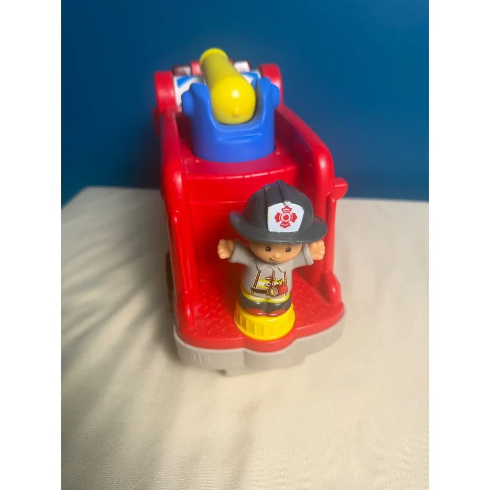 Fisher-Price Little People Lift n Lower Fire Truck Red Toy Vehicle with Figures